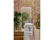 Exposed brick doorway showcasing living room with modern furnishings and decor at 170 Boulevard Se # 115E, Atlanta, GA 30312