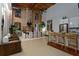 Open living space with kitchen, dining area, exposed brick, and high ceilings at 170 Boulevard Se # 115E, Atlanta, GA 30312