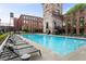 Resort-style pool with lounge chairs for relaxing by the water on a sunny day in a well-maintained community space at 170 Boulevard Se # 115E, Atlanta, GA 30312