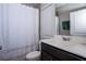 Clean bathroom with a vanity, and a shower with a curtain, offering practicality and comfort at 3005 Devoncroft Se St, Smyrna, GA 30080