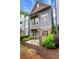 Charming two-story home with stone accents, landscaping, and a cozy outdoor patio at 3005 Devoncroft Se St, Smyrna, GA 30080