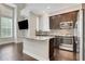 Modern kitchen featuring stainless steel appliances, granite countertops, and a center island at 3005 Devoncroft Se St, Smyrna, GA 30080