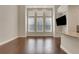 Spacious open floorplan living room with large windows and hardwood floors at 3005 Devoncroft Se St, Smyrna, GA 30080