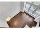 Bright entryway with tall windows, hardwood floors, and a decorative light fixture at 3005 Devoncroft Se St, Smyrna, GA 30080