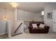 Cozy loft area featuring a comfortable leather loveseat and natural light at 3005 Devoncroft Se St, Smyrna, GA 30080