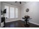 Office with hardwood floors, dark trim, and decorative wall art, offering a dedicated workspace at 3005 Devoncroft Se St, Smyrna, GA 30080
