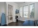 Bright office space with a view and adjacent bathroom, offering a versatile work-from-home setup at 3005 Devoncroft Se St, Smyrna, GA 30080