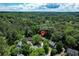 Aerial view of property at 878 Park Creek Court SW Marietta showing the home nestled among lush green trees at 878 Park Creek Sw Ct, Marietta, GA 30064