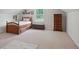 Bedroom with sloped ceiling and a window for natural light at 878 Park Creek Sw Ct, Marietta, GA 30064