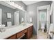 Spacious bathroom offering neutral colors, a vanity, and storage at 878 Park Creek Sw Ct, Marietta, GA 30064