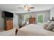 The main bedroom features two windows that let in plenty of natural light, and has a ceiling fan at 878 Park Creek Sw Ct, Marietta, GA 30064