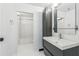 Clean, modern bathroom with a sleek vanity, mirror, and a separate shower and tub at 881 Memorial Se Dr # 307, Atlanta, GA 30316