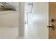 Bright hallway with modern design elements and natural light shining through the windows at 881 Memorial Se Dr # 307, Atlanta, GA 30316