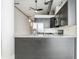 Modern kitchen features stainless steel appliances, dark cabinets, and an open layout at 881 Memorial Se Dr # 307, Atlanta, GA 30316