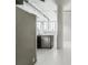 Modern kitchen featuring stainless steel appliances, granite countertops, and industrial-style elements at 881 Memorial Se Dr # 307, Atlanta, GA 30316