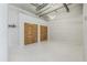 Modern living space featuring closets, neutral walls, contemporary lighting, and painted concrete floors at 881 Memorial Se Dr # 307, Atlanta, GA 30316