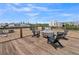 Rooftop deck with city views, complete with modern chairs and fire pit for relaxing and entertaining at 881 Memorial Se Dr # 307, Atlanta, GA 30316
