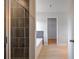 Modern main bathroom features a walk-in shower, bathtub, and access to walk-in closet at 17 Camellia Dr, Fairburn, GA 30213