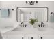 Contemporary bathroom with double sinks, white cabinets, quartz counters, and a large mirror at 2035 Stilesboro Nw Dr, Kennesaw, GA 30152