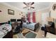 Bedroom featuring a ceiling fan, art on the walls, and a desk at 4060 Brumby Ln, Cumming, GA 30041