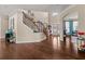 Welcoming foyer with hardwood floors, an elegant staircase, and plenty of natural light at 4060 Brumby Ln, Cumming, GA 30041