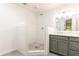 Bathroom with tiled shower and vanity at 511 Pine Springs Se Trl, Marietta, GA 30067