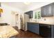 Well-equipped kitchen with stainless steel refrigerator and granite countertops at 511 Pine Springs Se Trl, Marietta, GA 30067