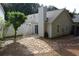 Backyard showcases a stone patio and a privacy fence perfect for entertaining at 1132 Britley Park Ln Ln, Woodstock, GA 30189