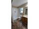 Bathroom with tiled shower, vanity, toilet, and tile flooring at 1132 Britley Park Ln Ln, Woodstock, GA 30189