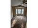 Bedroom with neutral walls, carpet floors, a ceiling fan, and a bay window at 1132 Britley Park Ln Ln, Woodstock, GA 30189