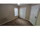 Bedroom featuring a ceiling fan, neutral walls, and carpet floors at 1132 Britley Park Ln Ln, Woodstock, GA 30189