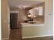 The kitchen has stainless steel appliances, lots of cabinet space, and modern countertops at 1132 Britley Park Ln Ln, Woodstock, GA 30189