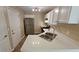 Kitchen with stainless steel appliances, white cabinetry, quartz countertops, and modern fixtures at 1132 Britley Park Ln Ln, Woodstock, GA 30189