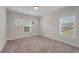 Bedroom featuring neutral walls and carpet with natural light coming from the window at 122 Grove View Rd, Woodstock, GA 30189