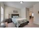Inviting bedroom with a comfortable bed, natural light, and easy access to the upper level of the house at 122 Grove View Rd, Woodstock, GA 30189
