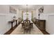 Charming dining room featuring a large table, elegant chairs, and decorative accents, perfect for Gathering gatherings and entertaining at 122 Grove View Rd, Woodstock, GA 30189