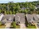 Charming homes boast manicured lawns, lush landscaping, and inviting curb appeal at 122 Grove View Rd, Woodstock, GA 30189