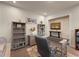 Well-appointed home office featuring elegant furnishings and ample storage, perfect for a comfortable and productive workspace at 122 Grove View Rd, Woodstock, GA 30189