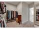 Spacious walk-in closet with shelving and clothing racks, leading to a bathroom at 122 Grove View Rd, Woodstock, GA 30189