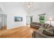 Bright living room featuring hardwood floors, high ceilings, and natural light at 3310 Southlake Ln, Cumming, GA 30041