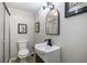 Small bathroom with shower, modern vanity, mirror and light fixture at 4067 Lenora Church Rd, Snellville, GA 30039