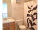 Well-maintained bathroom featuring a toilet and a white vanity at 4450 Ivy Fork Dr, Loganville, GA 30052