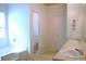 The bathroom has a double vanity, a garden tub, and a separate toilet at 4450 Ivy Fork Dr, Loganville, GA 30052