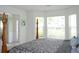 Beautiful bedroom featuring large bed and bay window at 4450 Ivy Fork Dr, Loganville, GA 30052
