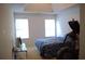 Bedroom with a window and exercise equipment at 4450 Ivy Fork Dr, Loganville, GA 30052