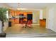 Spacious kitchen with stainless steel appliances, light wood cabinets and dining area at 4450 Ivy Fork Dr, Loganville, GA 30052