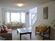 Cozy living room with a bay window and an inviting seating arrangement at 4450 Ivy Fork Dr, Loganville, GA 30052