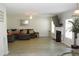 Bright living room with fireplace and neutral walls and flooring at 4450 Ivy Fork Dr, Loganville, GA 30052