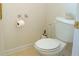 This bathroom has a standard toilet and tile floors at 4450 Ivy Fork Dr, Loganville, GA 30052