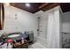 Charming bathroom features shiplap walls, modern fixtures, and a shower-tub combination at 549 Atwood Sw St, Atlanta, GA 30310